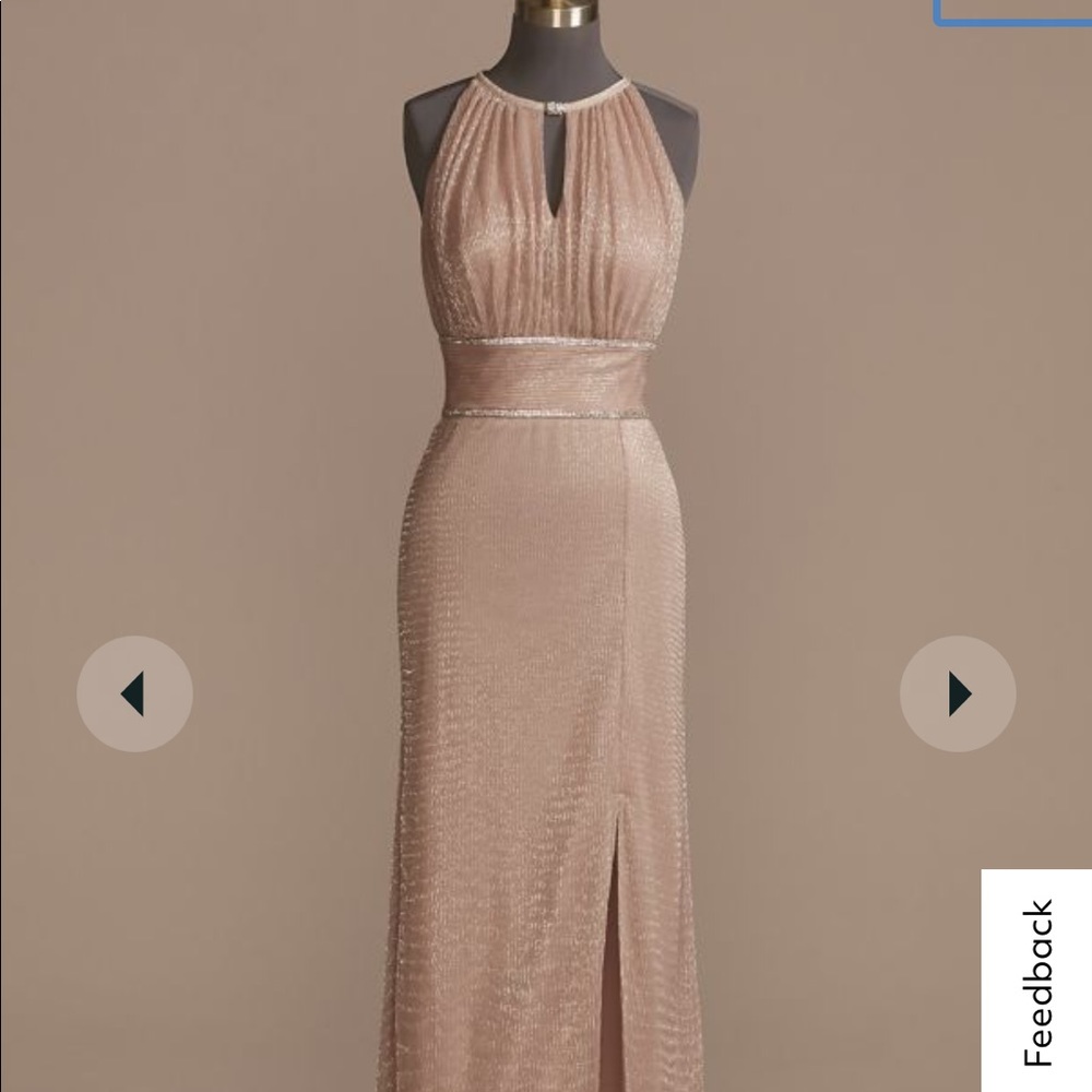 DAVIDS BRIDAL——-OLEG CASSINI

high-neck glitter a-line gown with keyholes